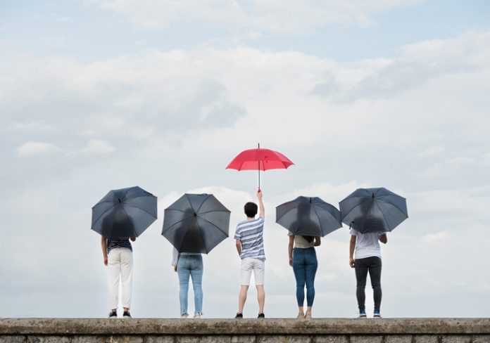 standing out from crowd and leadership concept